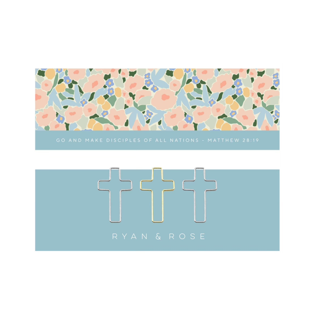 Floral patterned card with bookmark crosses and text on a white background