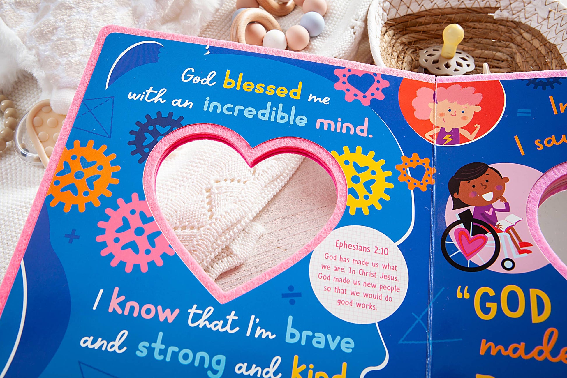 Children's book open to a page with a heart and text about strength and kindness.