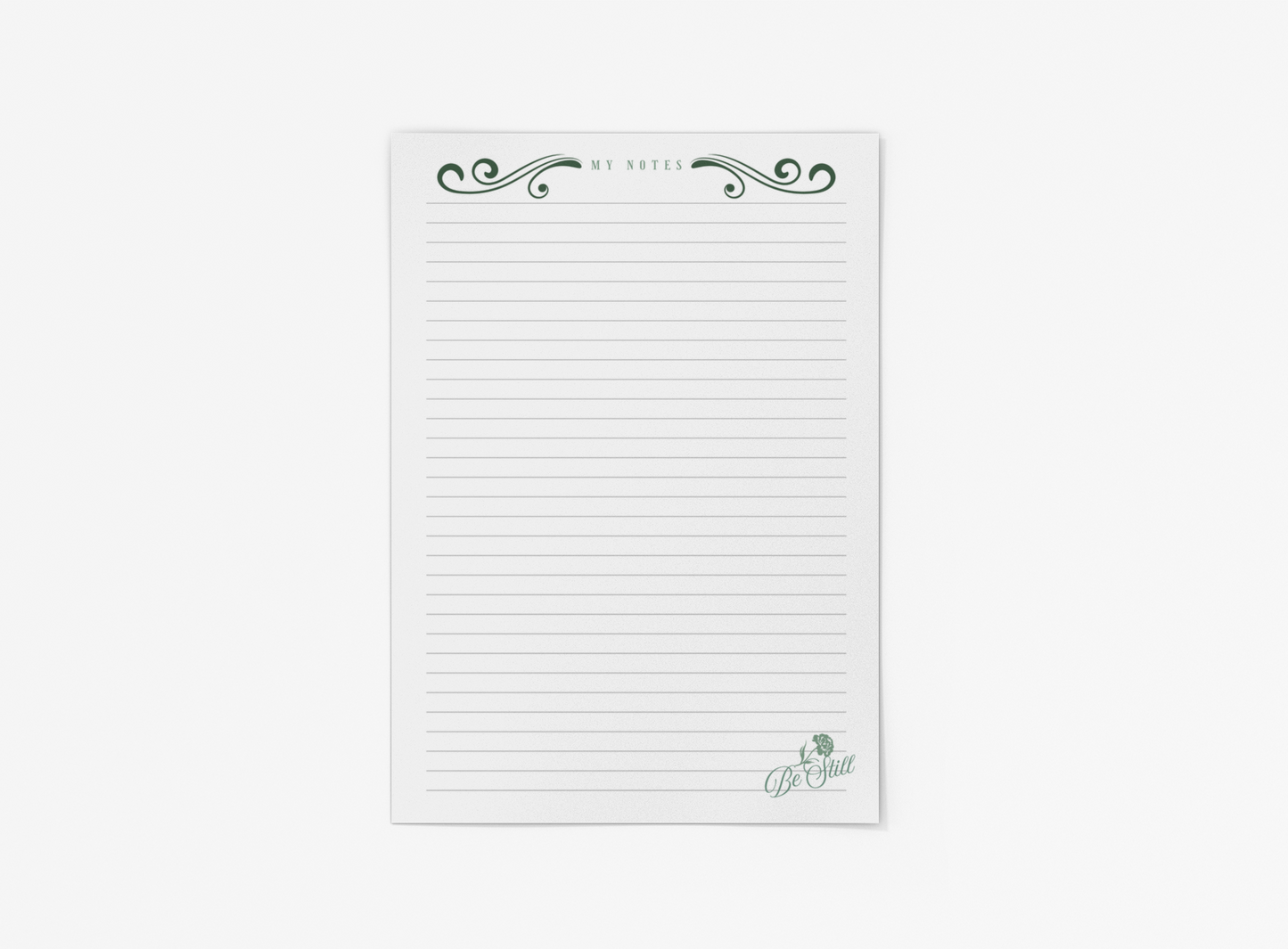 Lined notepad with decorative elements on a white background