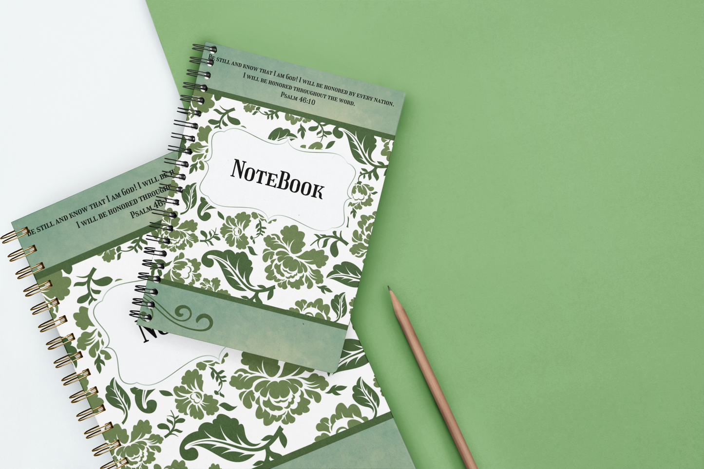 Notebook with floral design on a green background