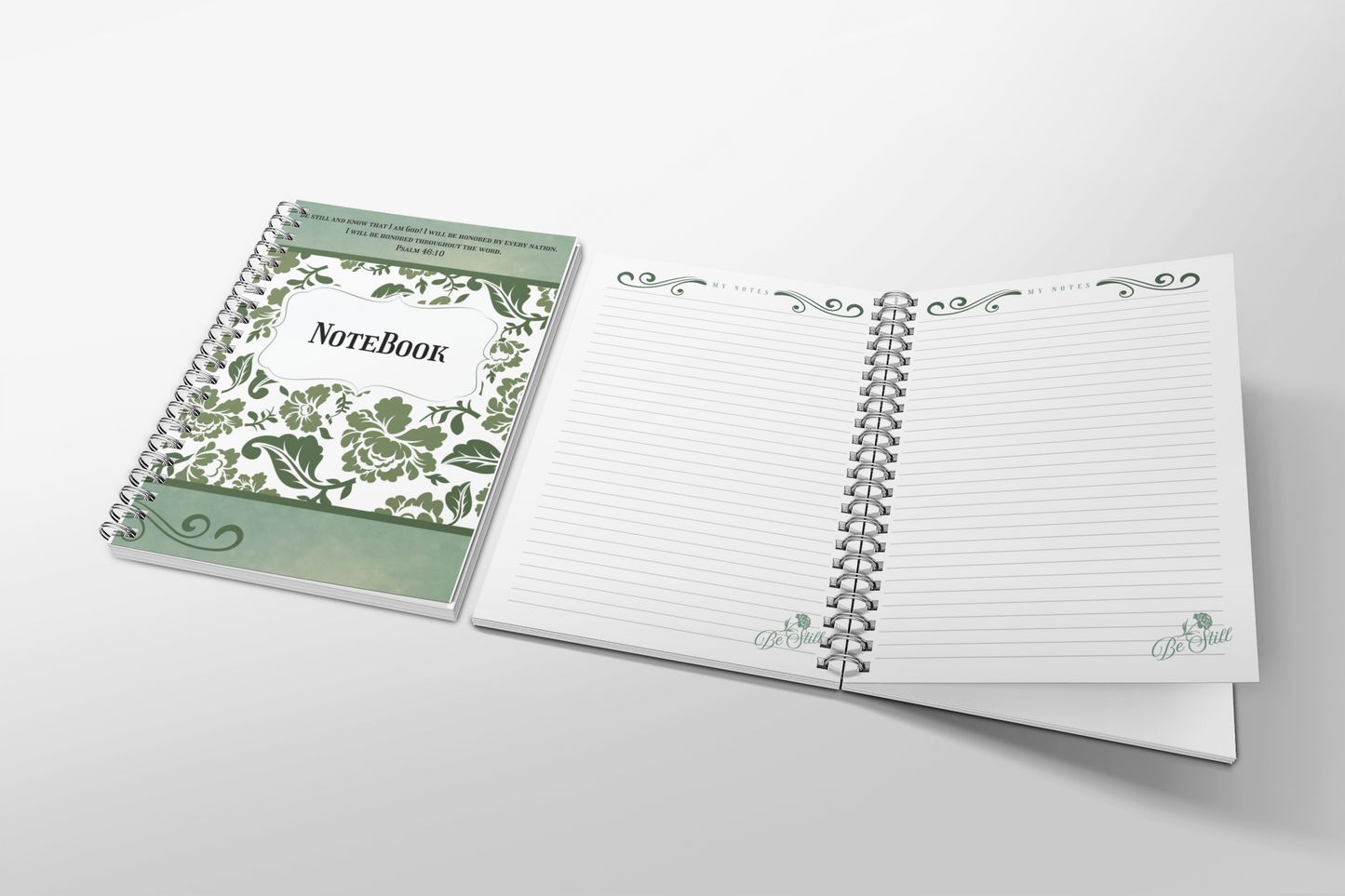 Open spiral-bound notebook with decorative cover on a light gray background