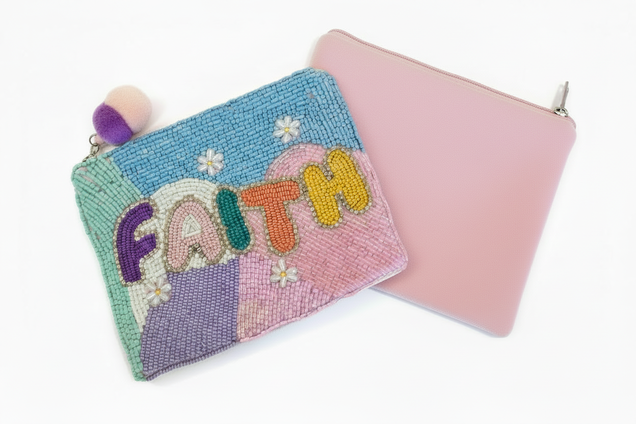 Two beaded pouches, one with 'FAITH' and flowers on a white background, the other pink canvas is showing the back of the pouch.