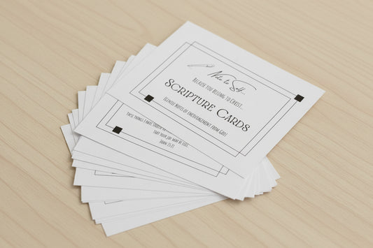 Stack of White linen textured 'Note to Self Scripture Cards' on a wooden surface