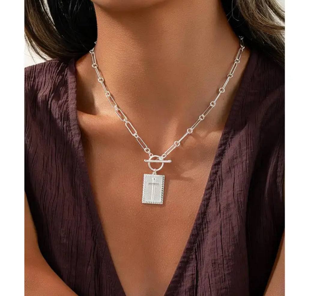 Women’s Elegant Minimalist Cross Pendant Necklace with Loop and Toggle Clasp Closure in both Silver and Gold