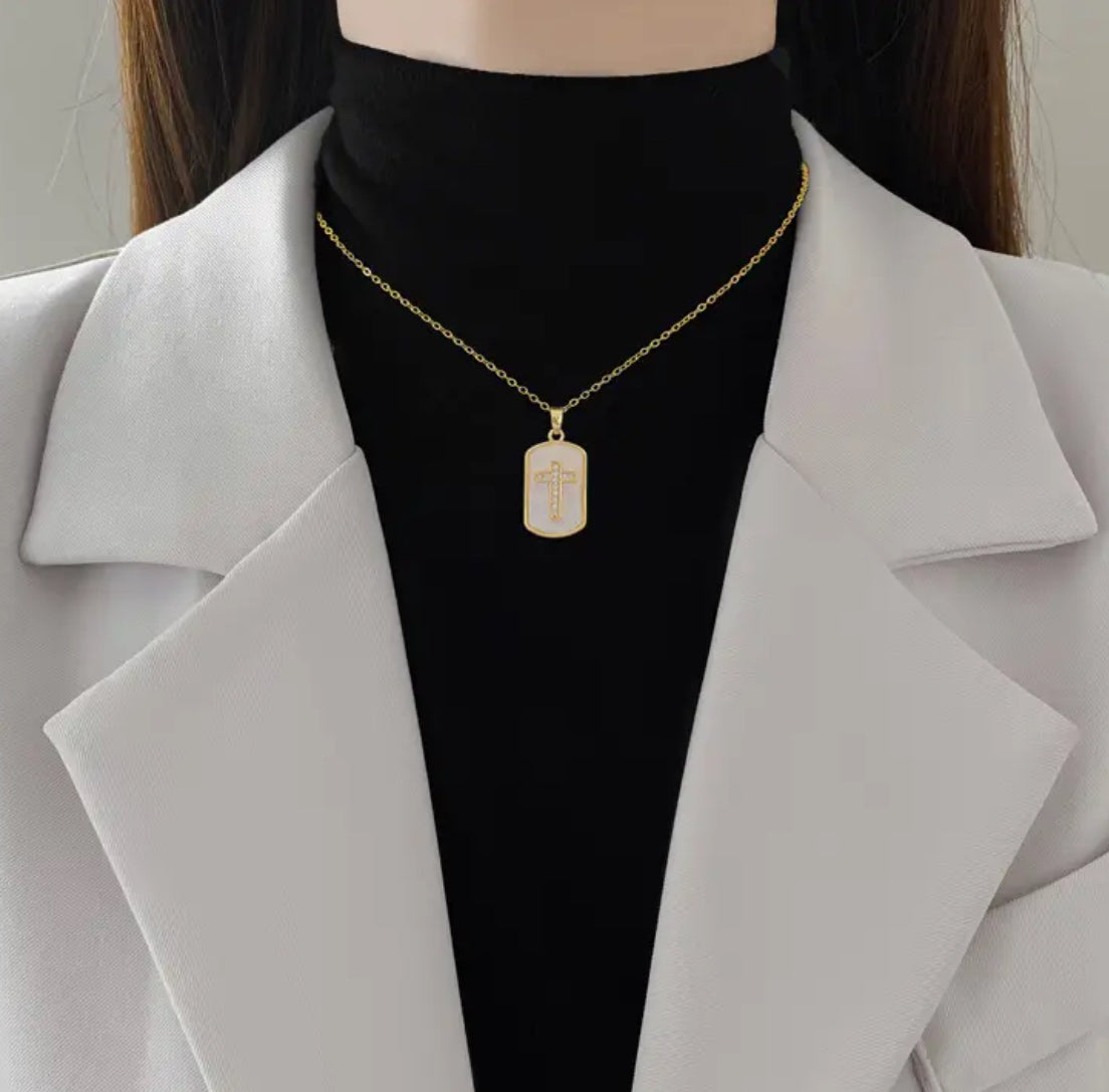 Golden-Toned Rectangular Pendant with Embellished Cross