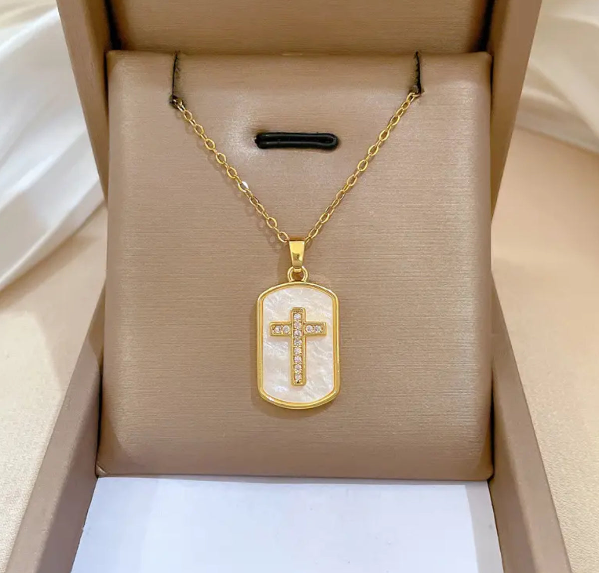 Golden-Toned Rectangular Pendant with Embellished Cross