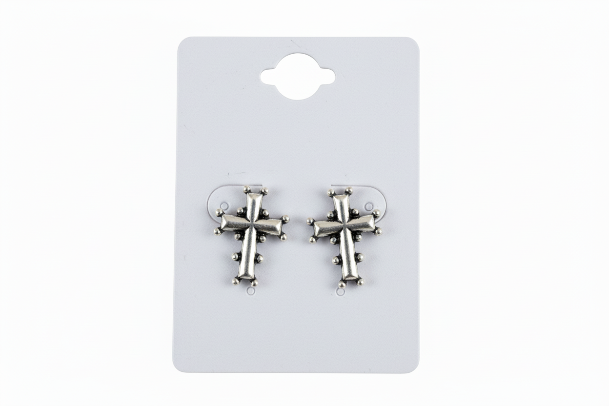 "Silver-Toned Cross Earrings with Embellishments."